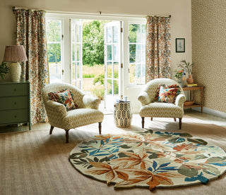 Brink and Campman Robin's Wood Russet Brown Area Rug by Sanderson Round Room Image Feature