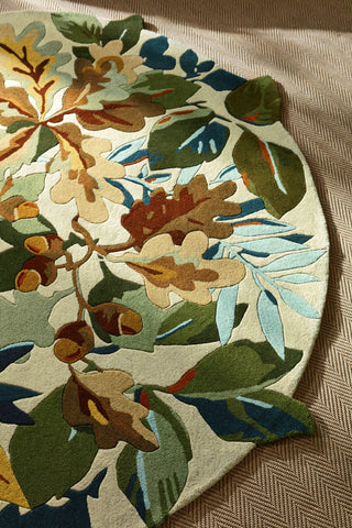 Brink and Campman Robin's Wood Russet Brown Area Rug by Sanderson Round Room Image Feature