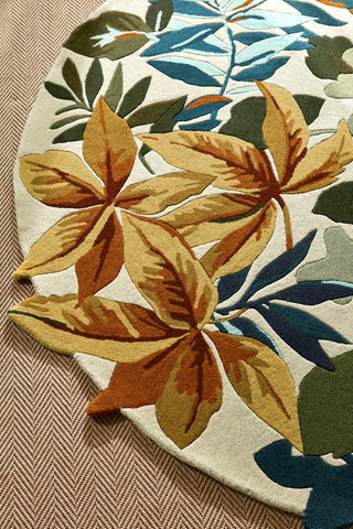 Brink and Campman Robin's Wood Russet Brown Area Rug by Sanderson Round Room Image Feature