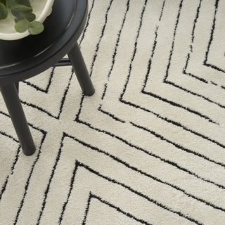 Nourison Cozy Modern CMD01 Ivory Black Area Rug Corner Image