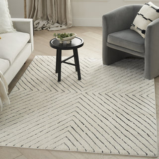 Nourison Cozy Modern CMD01 Ivory Black Area Rug Corner Image