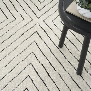 Nourison Cozy Modern CMD01 Ivory Black Area Rug Corner Image
