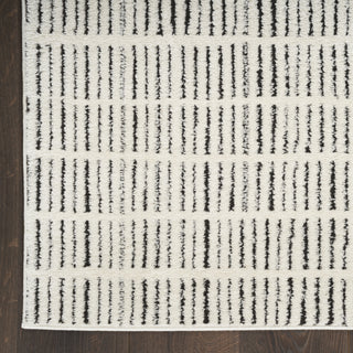 Nourison Cozy Modern CMD03 Ivory Black Area Rug 5' X 7'