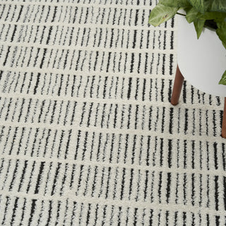 Nourison Cozy Modern CMD03 Ivory Black Area Rug Corner Image