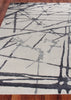Exquisite Rugs Space Age 2502 Silver/Gray/Ivory Area Rug by The Met Closeup Image