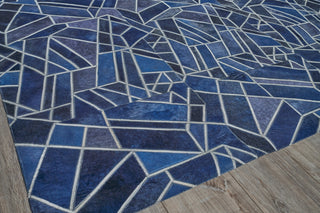 Exquisite Rugs Natural Hide 4780 Blue/Ivory Area Rug Corner Image