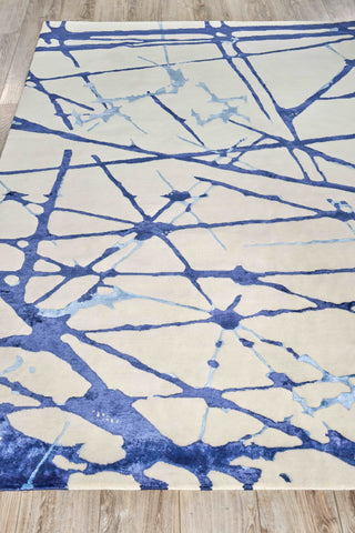Exquisite Rugs Space Age 4824 Ivory/Royal Blue/Navy Area Rug by The Met Closeup Image