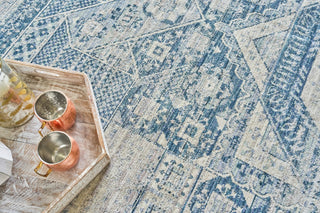 The Met X Exquisite Rugs Vintage Looms 5670 Light Blue/Blue Area Rug Lifestyle Image Feature