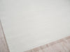 Exquisite Rugs Amani Modern 6763 White Area Rug Corner Image
