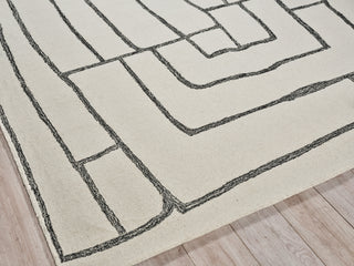 Exquisite Rugs Tangiers 6843 Ivory/Black Area Rug Corner Image