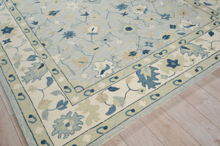 Exquisite Rugs Elegance 7353 Light Blue/Ivory/Navy Area Rug Corner Image