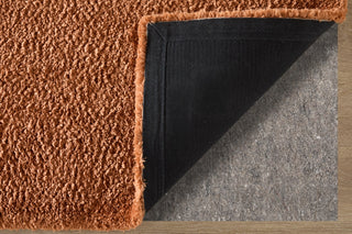 Feizy Tula 8A98F Orange Area Rug Corner Image with Rug Pad