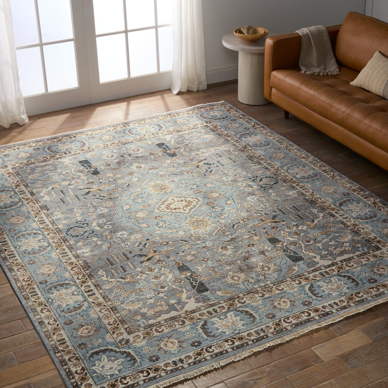 Jaipur Living Someplace In Time Pendulum SPT10 Blue/Brown Area Rug Lifestyle Image Feature