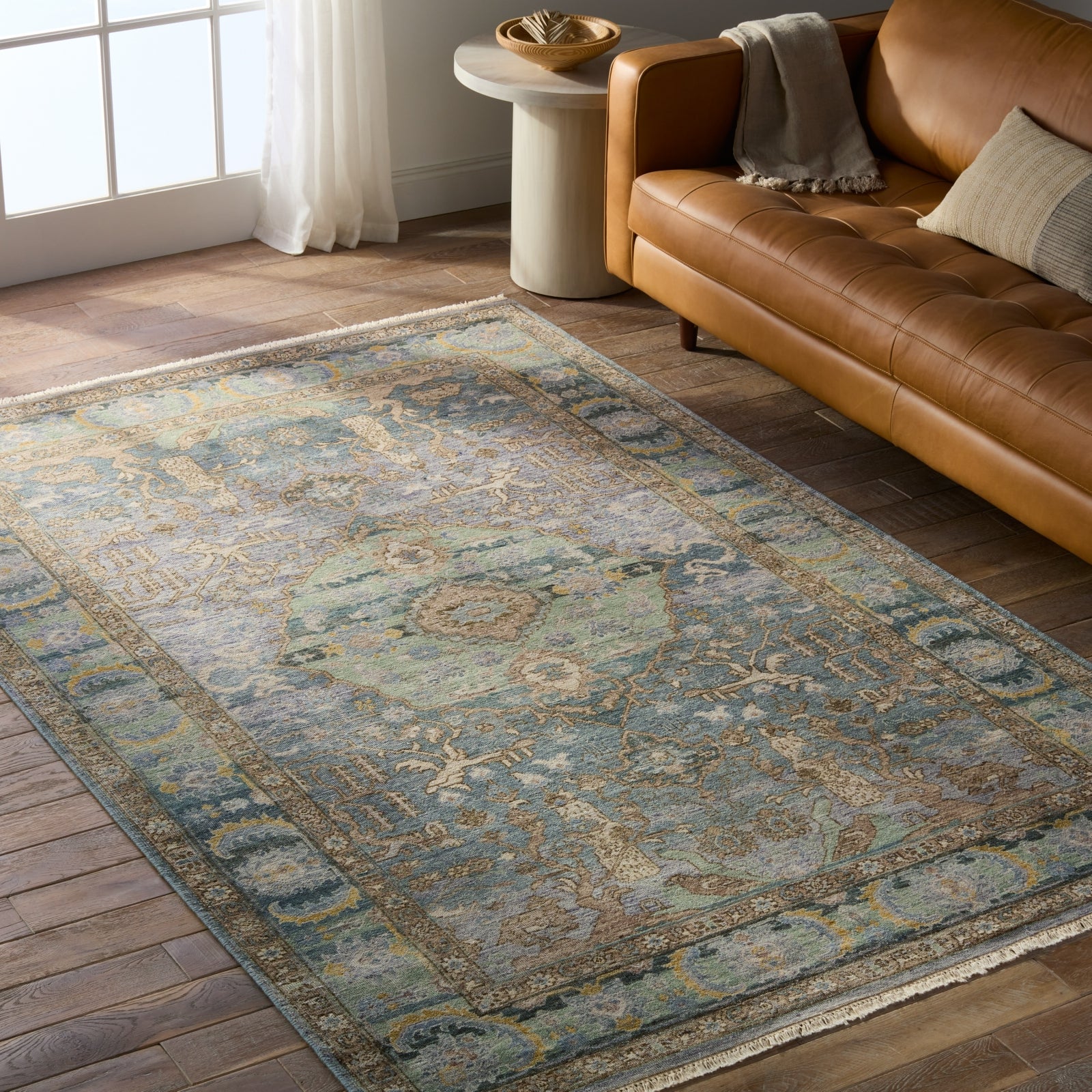 Jaipur Living Someplace In Time Pendulum SPT13 Blue/Gold Area Rug Lifestyle Image Feature