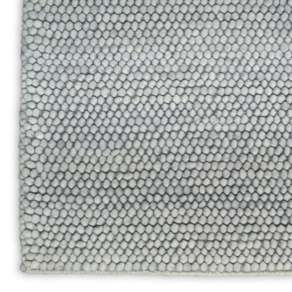 Nourison Pure Knots KNT01 Denim Area Rug by DKNY Corner Image