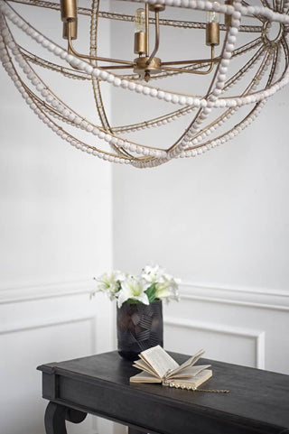 Ava White Gold Metal and White Wood Beaded Six Bulb Chandelier Lifestyle Image Feature