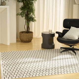 Nourison Nordic NRC12 Ivory Black Area Rug Corner Image