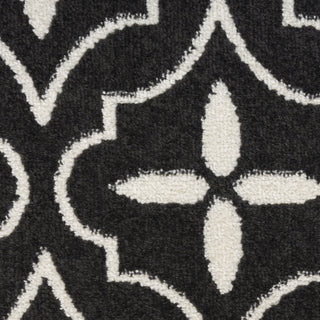 Nourison Essentials NRE04 Black Ivory Area Rug Corner Image