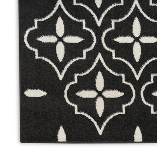 Nourison Essentials NRE04 Black Ivory Area Rug Corner Image