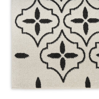 Nourison Essentials NRE04 Ivory Black Area Rug Corner Image