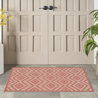 Nourison Versatile NRV01 Coral Orange Area Rug Room Image Feature