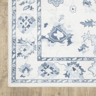 Oriental Weavers Addison ADD02 Ivory/ Blue Machine Washable Area Rug by PRINTS Corner Image