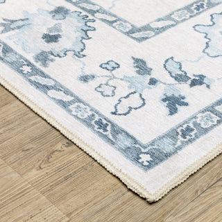 Oriental Weavers Addison ADD02 Ivory/ Blue Machine Washable Area Rug by PRINTS Corner Image