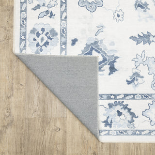 Oriental Weavers Addison ADD02 Ivory/ Blue Machine Washable Area Rug by PRINTS Backing Image