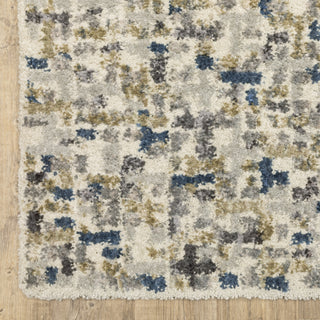 Oriental Weavers Aspen 3514A Ivory / Blue Area Rug Corner Image