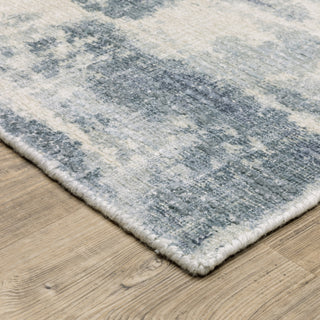 Oriental Weavers Clarke CLA07 Blue/ Ivory Area Rug Corner Image