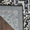 Nourison Passion PSN33 Black Ivory Area Rug Corner Image
