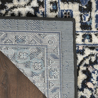 Nourison Passion PSN33 Black Ivory Area Rug Corner Image