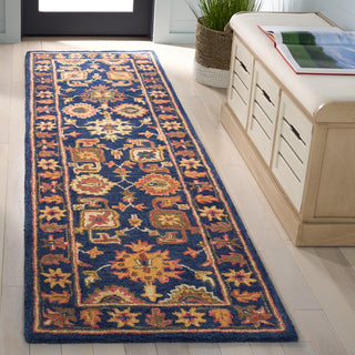 Safavieh Antiquity AT511N Navy / Beige Area Rug Room Scene Feature