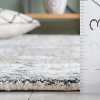 Safavieh Antiquity AT550T Ivory / Brown Area Rug Detail