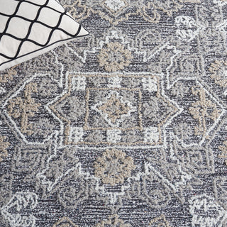 Safavieh Antiquity AT550T Ivory / Brown Area Rug Detail