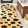 Safavieh Cambridge CAM147D Gold / Black Area Rug Room Scene Feature