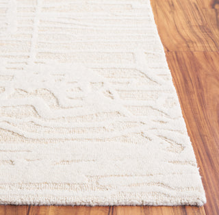 Safavieh Ebony EBN124D Gold / Ivory Area Rug Detail