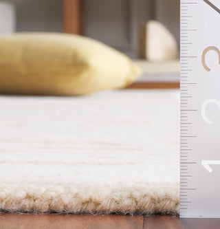 Safavieh Ebony EBN124D Gold / Ivory Area Rug Detail