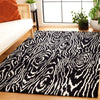 Safavieh Ebony EBN550Z Black / Ivory Area Rug Room Scene Feature