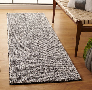 Safavieh Ebony EBN602Z Black / Ivory Area Rug Room Scene
