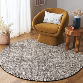 Safavieh Ebony EBN602Z Black / Ivory Area Rug Room Scene Feature