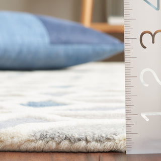 Safavieh Ebony EBN656A Ivory / Blue Area Rug Detail