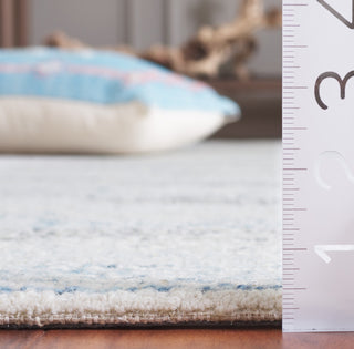 Safavieh Ebony EBN810M Ivory / Blue Area Rug Detail