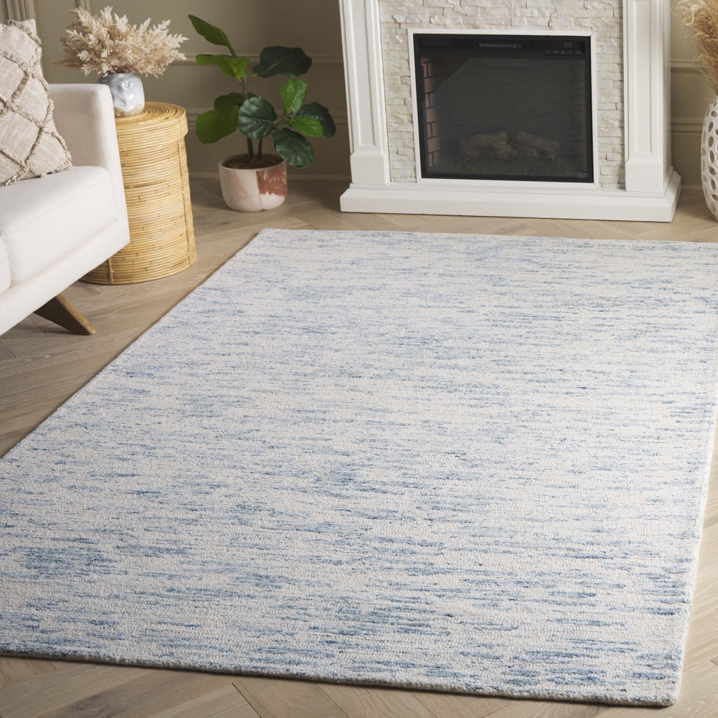 Safavieh Ebony EBN915A Ivory / Light Blue Area Rug Room Scene Feature