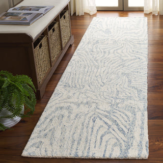 Safavieh Ebony EBN917L Ivory / Light Blue Area Rug Room Scene