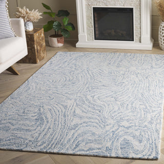 Safavieh Ebony EBN917L Ivory / Light Blue Area Rug Room Scene