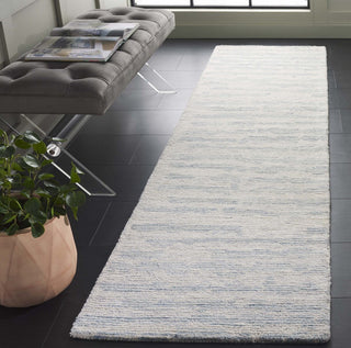 Safavieh Ebony EBN919L Ivory / Light Blue Area Rug Room Scene Feature