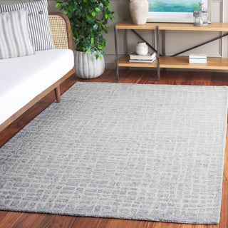 Safavieh Ebony EBN920L Ivory / Light Blue Area Rug Room Scene