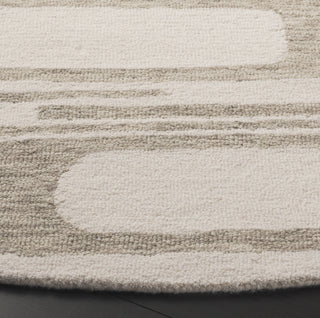 Safavieh Ebony EBN951Y Ivory / Green Area Rug Detail