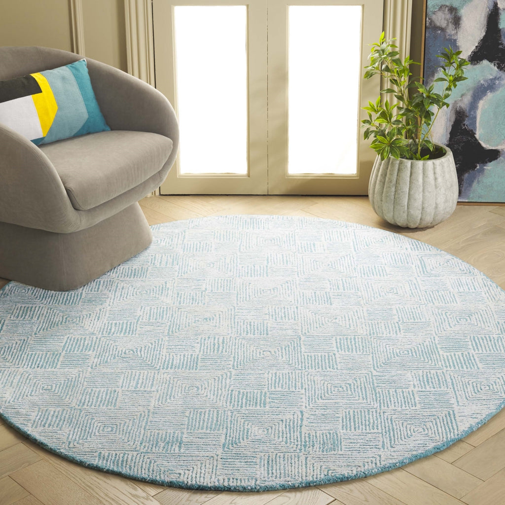 Safavieh Glamour GLM401K Ivory / Turquoise Area Rug Room Scene Feature